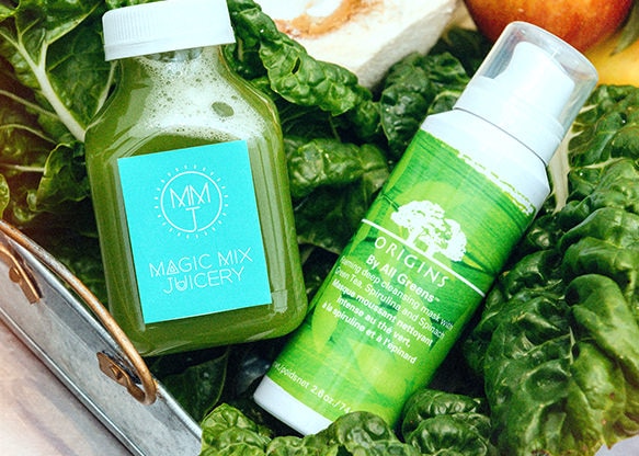 A bottle of magic mix juicery and a bottle of origins deep cleansing mask